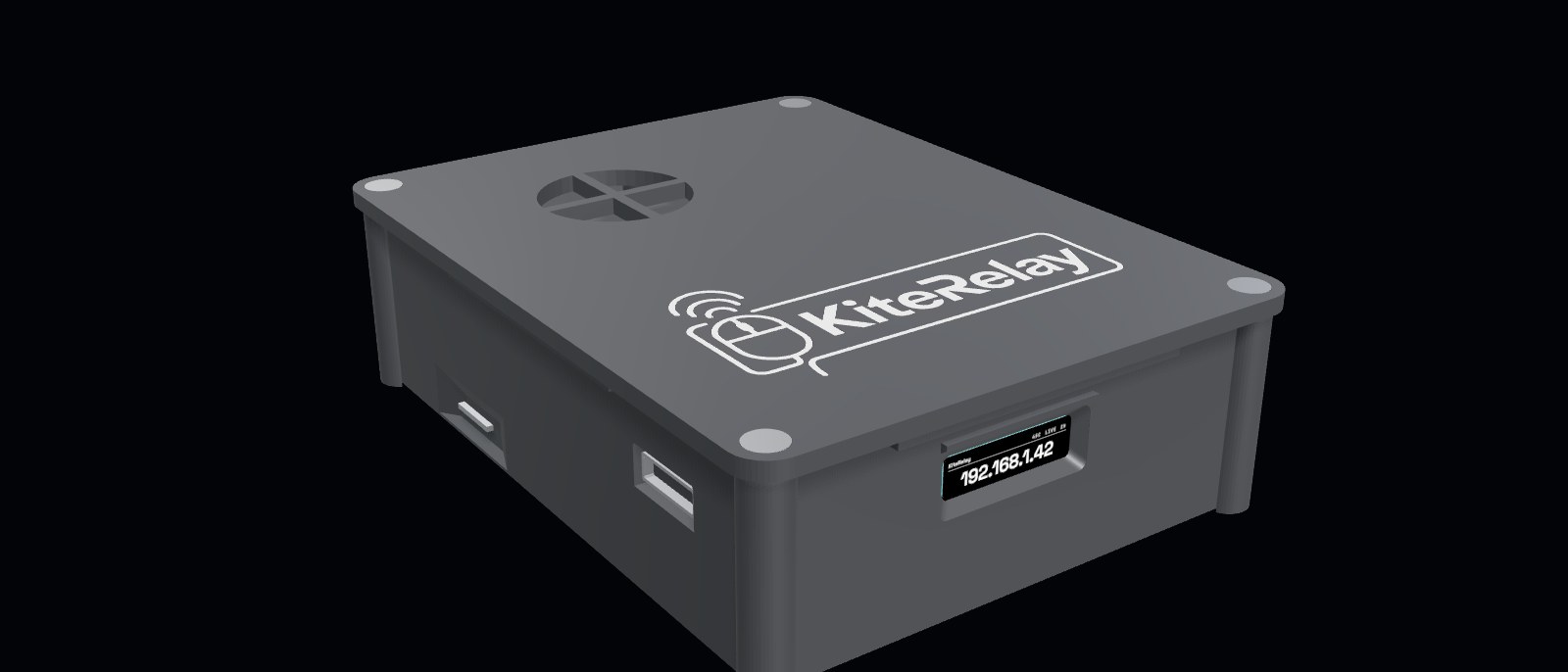 The KiteRelay device: a small sealed box with its name inlaid in the lid, its small screen lit on the front showing its address, and connector sockets along one side.